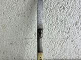 a knife that is sitting on top of a table