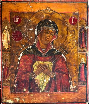 une peinture ancienne représentant une femme tenant un bébé dans ses bras