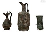 three vases and a vase on a white background