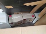 two boxes that are sitting on the floor next to each other
