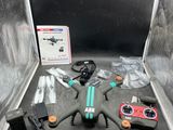 a box with a remote control and other items in it