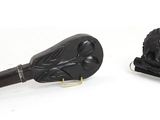 two black objects on a white surface