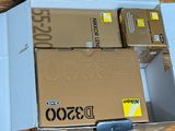 a box of boxes sitting on top of a wooden table