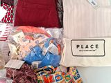 a pile of clothing that is sitting on a table