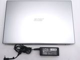 a laptop computer that is sitting on a table