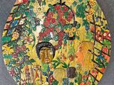 painting of a woman ' s face in a garden with flowers and birds