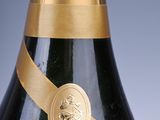 a close up of a bottle of champagne on a table