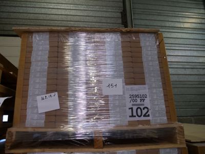 a pallet full of plastic wrap on top of a pallet