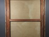 an old picture frame with a window on a black background