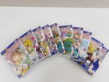 a bunch of anime books sitting on top of a white table