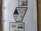 a picture of a binder with pictures and stamps on it