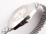 a close up of a wrist watch with a chain around it