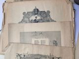 a table with a bunch of old papers on top of it