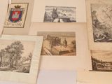 many different types of drawings displayed on a table