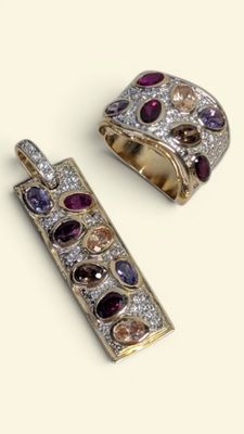 pair of diamond, amethorate, and garnett earrings