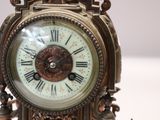 a clock that is sitting on top of a table