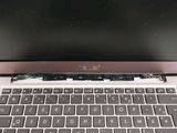 a laptop that has a keyboard on the top of it