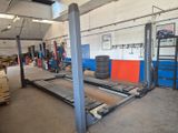an image of a garage with a lot of equipment in it