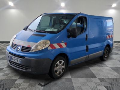 a picture of a blue van parked in a garage