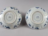 pair of chinese blue and white porcelain plates with floral designs