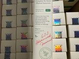 a lot of boxes of different colored nail polishes