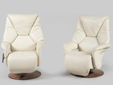two white recliners sitting side by side on a grey background