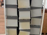 several stacks of books stacked on top of each other on a pallet