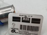 a small silver canister with a label on it