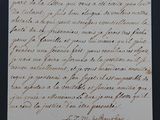 une vieille lettre écrite en cursive sur un bout de papier