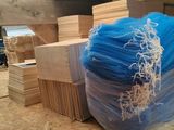 a pile of wood sitting on top of a wooden floor