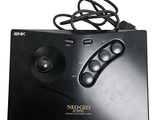 a close up of a game controller on a white background