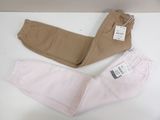 two pairs of pink and brown pants sitting on top of a white table