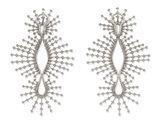 a pair of silver earrings on a white background