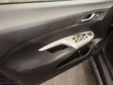 the interior of a car with the door open showing the control panel