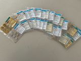 a lot of packets of pills on a table