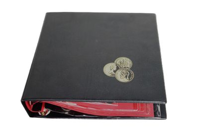 a close up of a book with a coin on top of it