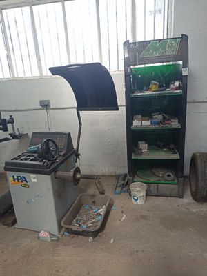 an image of a garage with a lot of junk