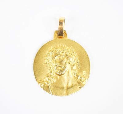 a close up of a gold medal with a lion on it