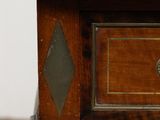 a close up of a wooden table with a marble top