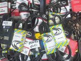 many different types of belts on the floor
