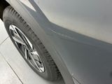 a close up of a car ' s tire on the street