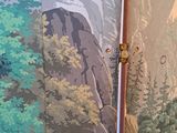 a picture of a room divider with a painting on it
