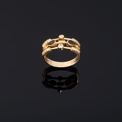 an 18k gold ring set with diamonds