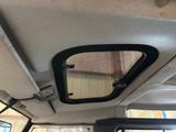a view of the inside of a vehicle from the passenger seat