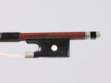 a violin bow that is attached to a string