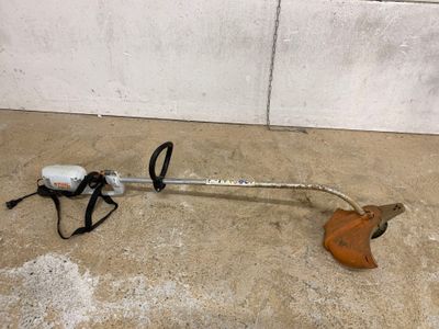 a metal pole with a handle and a cord attached to it