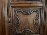 a wooden door that has a decorative design on it