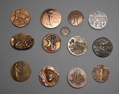 a lot of coins that have been placed on a table