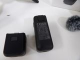 two cell phones that are sitting on a table