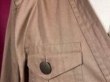 a close up of a shirt and tie on a mannequin mannequin